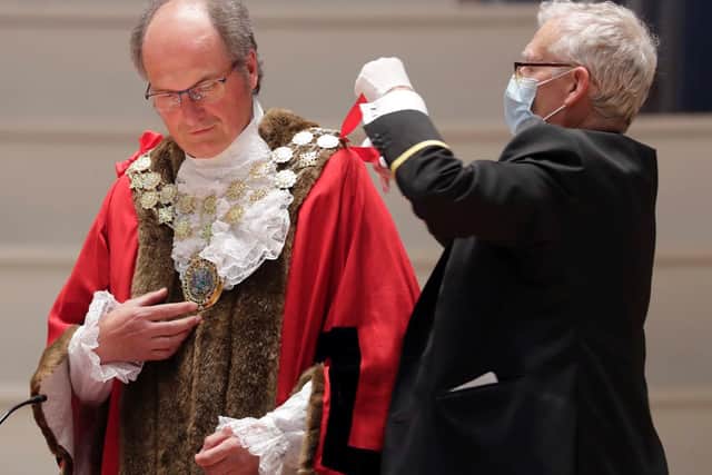 New Mayor of Kirklees Coun Nigel Patrick is given the chain of office