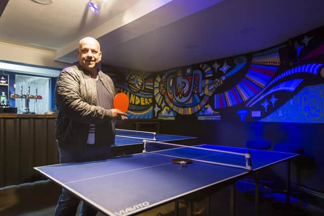 The revamped cellar now boasts bespoke graffiti art on the walls and ping pong tables