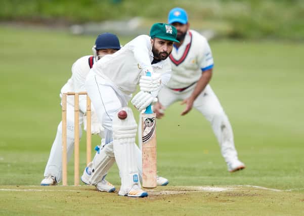 Ali Rafiq, on his way to making an unbeaten 80 on his debut for Scholes against Wakefield St Michael's. Picture: John Clifton