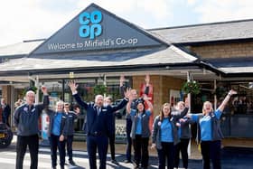 Staff celebrate the completion of a £1m makeover at Mirfield Co-op