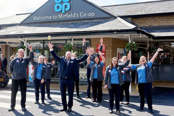 Staff celebrate the completion of a £1m makeover at Mirfield Co-op