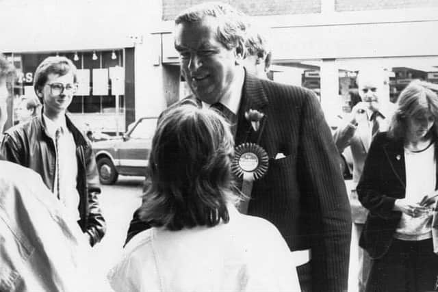 Reporter Martin Shaw, back left, covering a visit by former Chancellor Denis Healey around Batley Market back in 1989