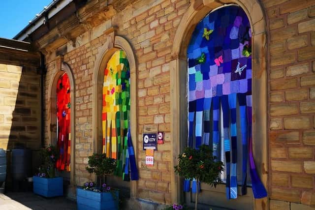 The knitted rainbow at Batley Station