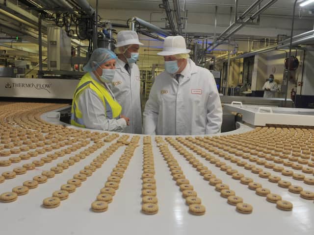 Prime Minister Boris Johnson visits the Fox's Biscuits factory in Batley with Ryan Stephenson, the Conservative candidate in the upcoming Batley and Spen by-election. Photo by Mike Simmonds