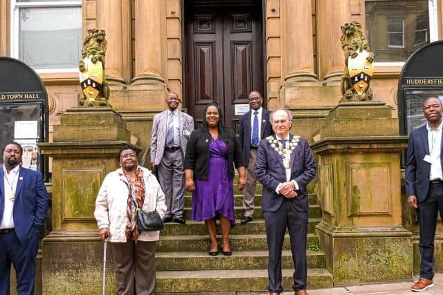 Pictured from left to right are Myles Lawrence, Cynthia Felix, Orlando Brown, Linda Johnson, Johnny Flowers, Mayor of Kirklees Coun Nigel Patrick and Mark Morris