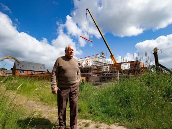 George Silverwood is extremely disappointed to have factories and housing built all around his home in Mirfield
