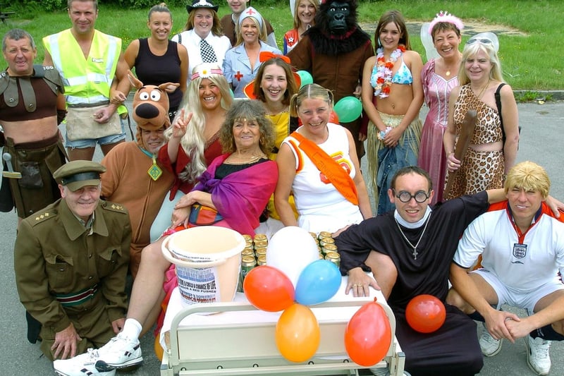 Regulars from The Dalesman pub in West Park take part in a charity bed push to raise money for Candlelighters and ward 58 at Leeds General Infirmary.