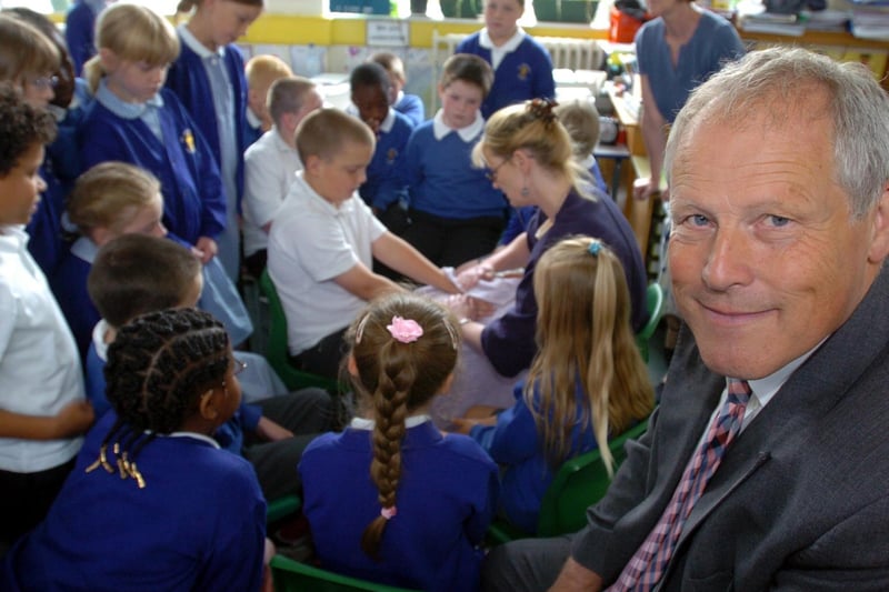 Head teacher Jeff Mills is pictured as  pupils enjoy hand massages as part of a health week at St Patrick's Catholic Primary.