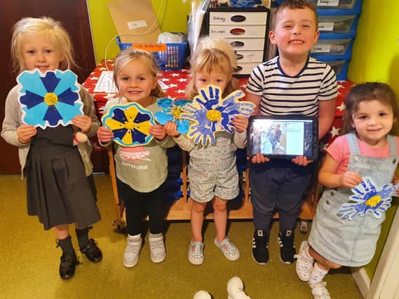 Children at Child's Play nursery on Thornhill Road in Dewsbury have made decorations for nearby Oak Park care home