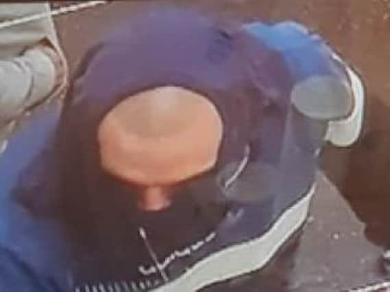 A CCTV image of one of the men that police would like to identify