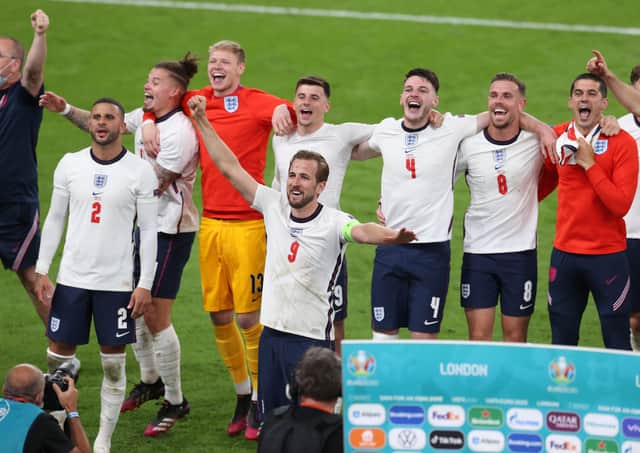 England celebrate their side's victory towards the fans after the UEFA Euro 2020 Championship Semi-final match between England and Denmark at Wembley Stadium on July 07, 2021 in London, England. (Photo by Catherine Ivill/Getty Images)