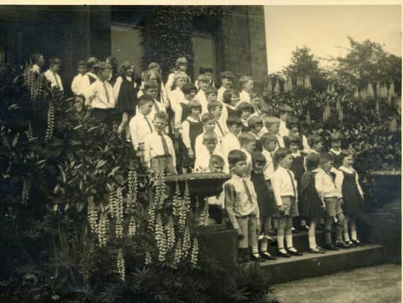 MARLBOROUGH SCHOOL: Children standing outside Marlborough House which at this time had been converted into a private school known as Marlborough School. Many of its pupils would later become pupils of Wheelwright Grammar School situated just across the road.