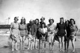 HAPPY DAYS: This group of young ladies are enjoying a day trip to Scarborough when the sun never stopped shining and the sea was warm. They all worked for Speights Lampshades in Batley Carr and later in Mirfield.