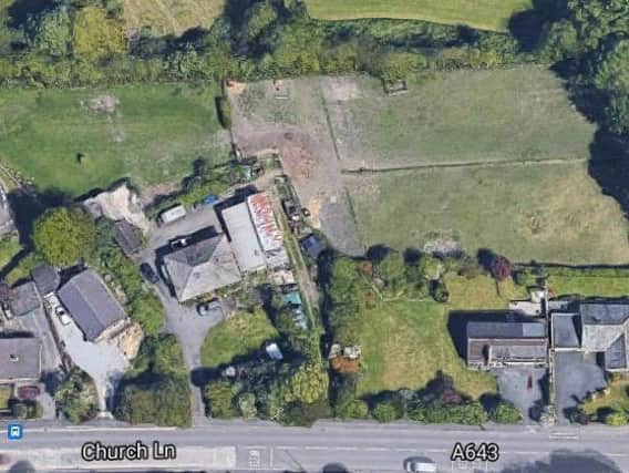 Land at Church Lane in Gomersal, where houses are to be pulled down to make way for 21 new homes on nearby fields (image: Google)