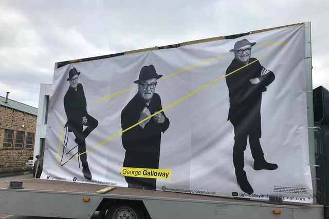 A mobile poster advertising Batley and Spen candidate George Galloway during the by-election campaign