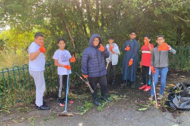 The youngsters helped clear rubbish and brambles as part of the project