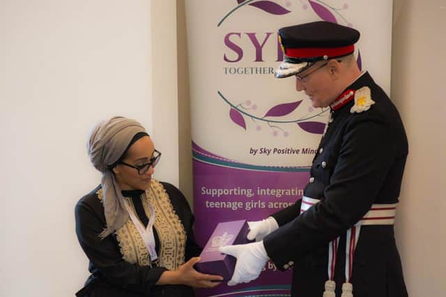 Lord Lieutenant Ed Anderson presents the Queen's Award for Voluntary Service to Shaffia Khatun, of SKY Positive Minds. Photo by SKI Photography