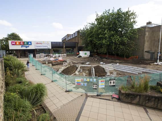 Work is ongoing on the pedestrian area outside Dewsbury Library