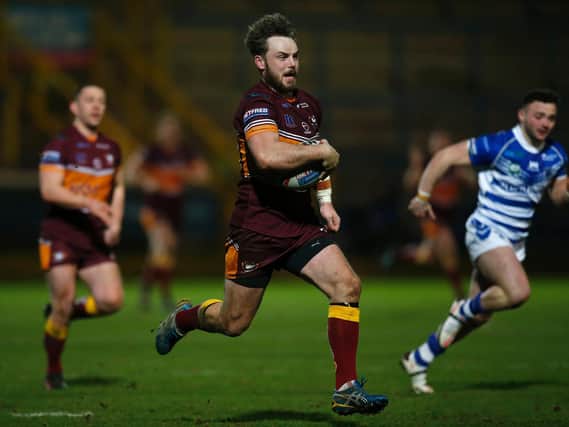 Picture by Ed Sykes/SWpix.com - 20/03/2021 - Rugby League - Betfred Challenge Cup Round 1 - Halifax Panthers v Batley Bulldogs - The Shay Stadium, Halifax, England - Batley Bulldogs’ Jack Logan runs in to score their first try