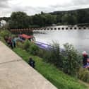 Riverboats became stuck on a weir on the River Calder at Ravensthorpe