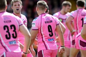 Batley Bulldogs players take part in the Pink Weekend.