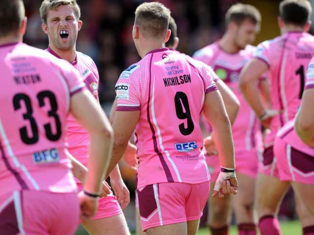 Batley Bulldogs players take part in the Pink Weekend.