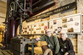 Calderdale Industrial Museum. Volunteers Geoff and Pam Whippey with the 1899 Asquith's drill which was used in the construction of Sydney Harbour Bridge.