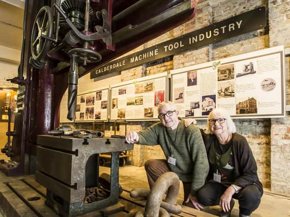 Calderdale Industrial Museum. Volunteers Geoff and Pam Whippey with the 1899 Asquith's drill which was used in the construction of Sydney Harbour Bridge.