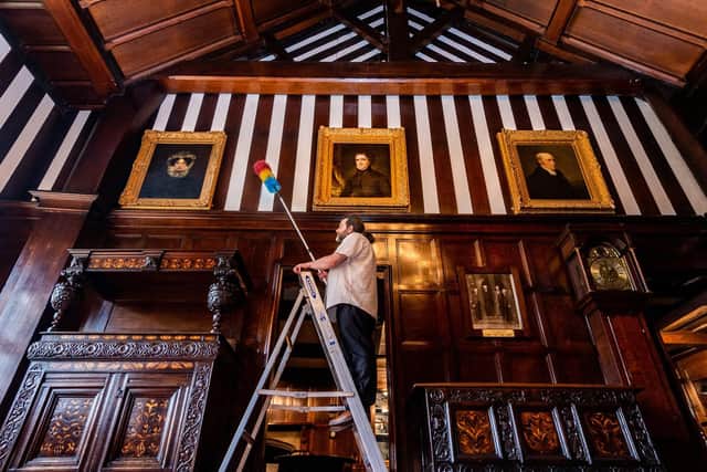 Christopher Southwell, visitor services and volunteer co-ordinator for Calderdale Museums, preparing to clean the housebody of Shibden Hall, Halifax