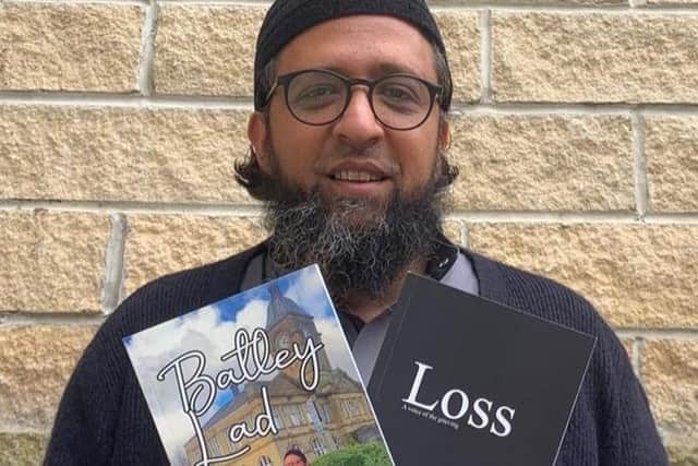 Mohamed with his two books