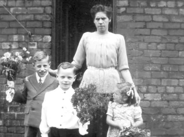 HAPPY DAYS: Ethel Atkinson, pictured more than 60 years ago outside her home on South Woodbine Street on The Flatts, with three of her children who took part in Granville Street Chapel’s Flower Sunday