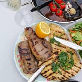 Juicy steaks served with homemade flatbreads and salad