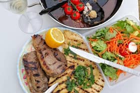 Juicy steaks served with homemade flatbreads and salad