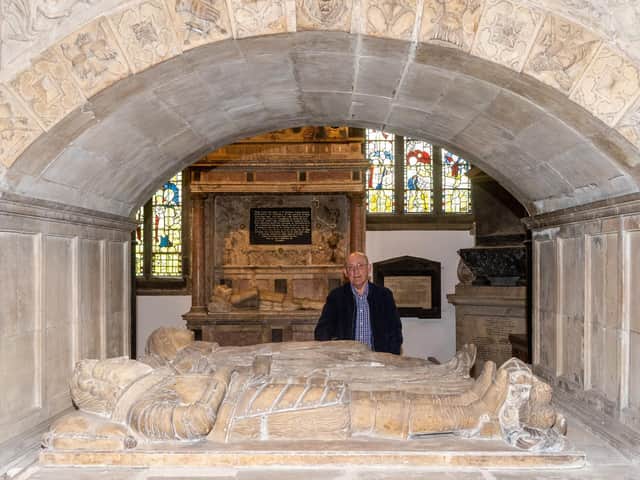 Brian Pearson, chairman of the fabric group, at Thornhill Parish Church next to The tomb of Sir George Savile and his wife Anne, marked by a massive Renaissance monument