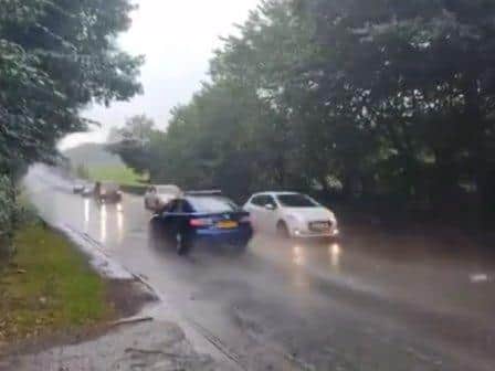 The sudden deluge created hazardous driving conditions