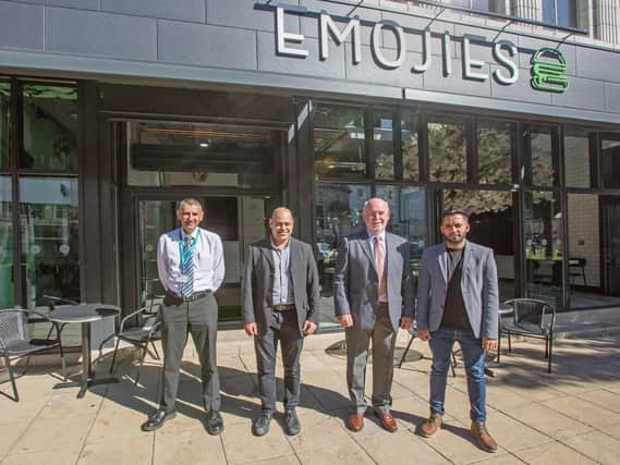 John Lambe, Kirklees project officer; Hamid Dhorat, DK Architecture; Coun Eric Firth, cabinet member for town centres; and Imran Ahmed, owner of Emojies