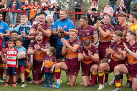 Batley players celebrate after their play-off win over Bradford Bulls. Picture: Neville Wright