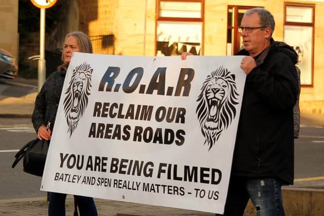 Members of the Reclaim Our Area's Roads (ROAR) group at a recent protest