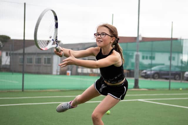 Ada Gale, aged nine, at Liversedge Tennis Club