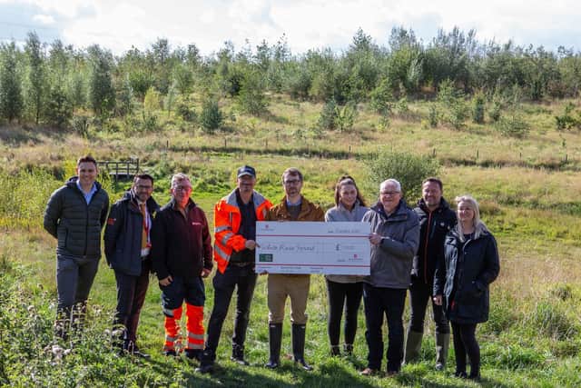 The Dewsbury Country Park team has received a £1,000 donation from UK Greetings, which is based in the town, to enable more trees to be planted at the site