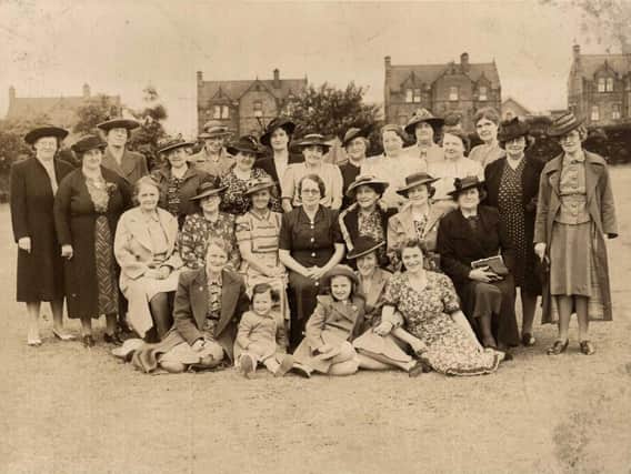 Dewsbury Ladies’ Linen Guild in the 1930s: Pictured on Healds Road in front of what used to be the Cottage Homes. Bella Smith is pictured seated on the second row, fifth from the left wearing a coat with a fur lining on the collar. Three of the other ladies in the picture are Mrs Speight, Mrs Lydia Brewer and Mrs Thornton.