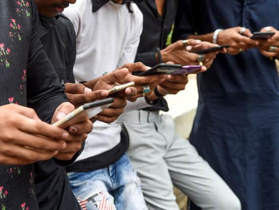 PHONE ADDICTION: Social media outage caused panic. Photo: Getty Images