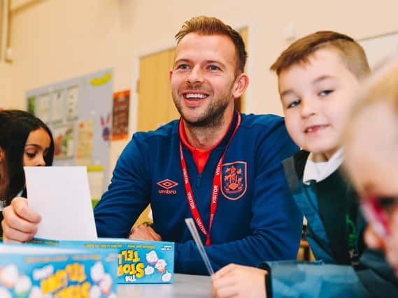 Huddersfield Town striker Jordan Rhodes visited children at Orchard Primary Academy in Chickenley