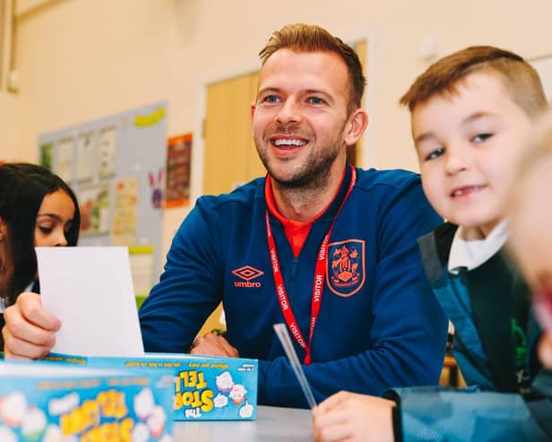 Huddersfield Town striker Jordan Rhodes visited children at Orchard Primary Academy in Chickenley