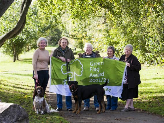 The Friends of West End Park, Cleckheaton have received a Green Flag Award. Pictured from the left are chairwoman Helen Marsden with Oken, treasurer Ann Baxter with Mia, Jane Thompson, Margaret Atkinson and Ruth Dawkins