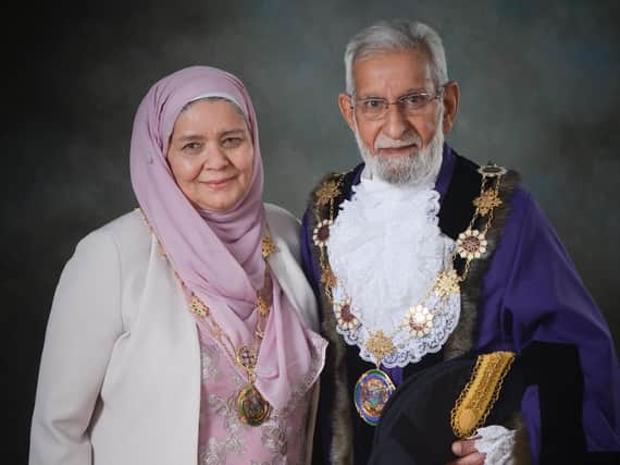 Batley East councillor Mahmood Akhtar, currently the Deputy Mayor of Kirklees, pictured with his wife. He is to step down in 2022 and will not now become Mayor