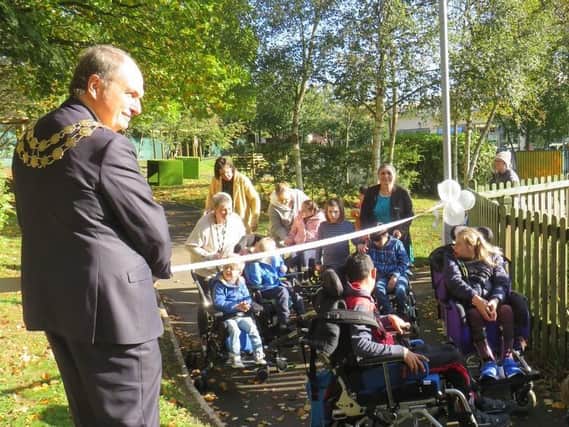 Mayor of Kirklees Coun Nigel Patrick officially opens the new sensory meadow at Fairfield School in Batley