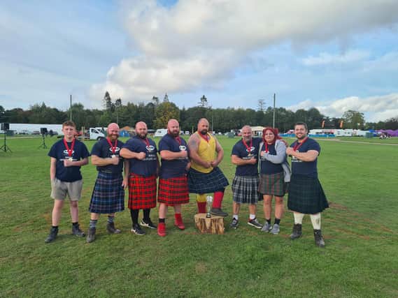 Dave Thornton (in the yellow vest) with fellow competitors at the Norfolk Highland Games