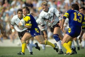 1 Sep 1991: Bobby Goulding (second left) of Leeds gets away from the Widnes defence during a Stones Bitter Championship match at Naughton Park in Widnes, England. \ Mandatory Credit: Chris Cole/Allsport