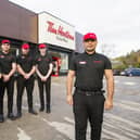 Pictured at the new Tim Hortons drive thru in Birstall are, from the left, Eve Pendlebury, Noah Arif, manager Luke Powell, Tom Kavanagh and store manager Mohan Bhatt